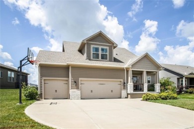 Tucked inside a premier resort-style neighborhood, this stunning on Golf Club of Creekmoor in Missouri - for sale on GolfHomes.com, golf home, golf lot