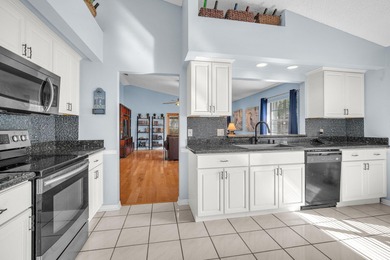 Beautifully maintained home located in a man-gated, golf course on Atlantic National Golf and Country Club in Florida - for sale on GolfHomes.com, golf home, golf lot