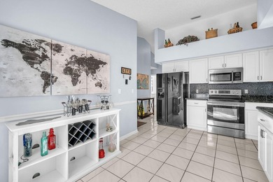 Beautifully maintained home located in a man-gated, golf course on Atlantic National Golf and Country Club in Florida - for sale on GolfHomes.com, golf home, golf lot