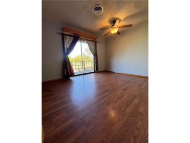 Spacious 2 story home has a great view of the local Municipal on Alice Municipal Golf Course in Texas - for sale on GolfHomes.com, golf home, golf lot