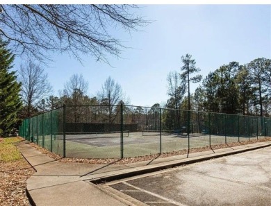 Welcome to this 5-bedroom, 4-bathroom home nestled in a vibrant on Indian Creek Golf Club in Georgia - for sale on GolfHomes.com, golf home, golf lot