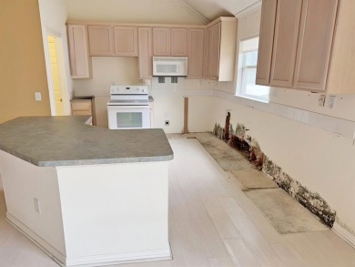 Lots of potential here with Great open floorplan, screened in on Wildhorse Golf Club of Robson Ranch in Texas - for sale on GolfHomes.com, golf home, golf lot