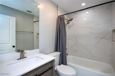 The perfect island retreat! Enjoy beautiful lake views from this on The Dunes Golf and Tennis Club in Florida - for sale on GolfHomes.com, golf home, golf lot