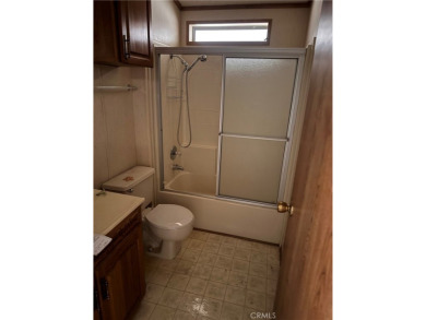 Welcome to this spacious 2-bedroom, 2-bath mobile home offering on The Club At Shenandoah Springs in California - for sale on GolfHomes.com, golf home, golf lot