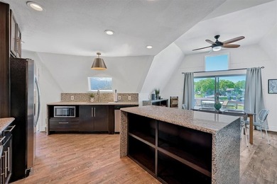 Unique lakefront home with nice updates, two bedrooms and  2 on Lake Kiowa Golf Course in Texas - for sale on GolfHomes.com, golf home, golf lot