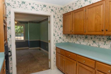 Must see this Fixer Upper GOLF HOME that sits behind the scenic on Monticello Golf Club At Savannah Lakes in South Carolina - for sale on GolfHomes.com, golf home, golf lot