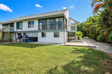 The perfect island retreat! Enjoy beautiful lake views from this on The Dunes Golf and Tennis Club in Florida - for sale on GolfHomes.com, golf home, golf lot