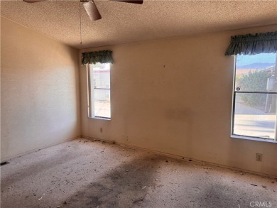 Welcome to this spacious 2-bedroom, 2-bath mobile home offering on The Club At Shenandoah Springs in California - for sale on GolfHomes.com, golf home, golf lot
