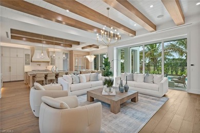 Enjoy sweeping southern exposure and serene golf course views on The Moorings Country Club in Florida - for sale on GolfHomes.com, golf home, golf lot