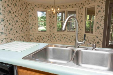 Must see this Fixer Upper GOLF HOME that sits behind the scenic on Monticello Golf Club At Savannah Lakes in South Carolina - for sale on GolfHomes.com, golf home, golf lot