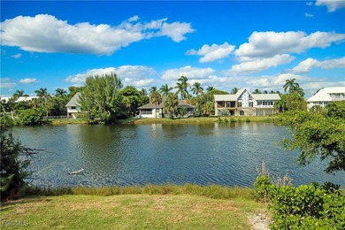 The perfect island retreat! Enjoy beautiful lake views from this on The Dunes Golf and Tennis Club in Florida - for sale on GolfHomes.com, golf home, golf lot