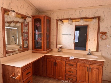 Welcome to this spacious 2-bedroom, 2-bath mobile home offering on The Club At Shenandoah Springs in California - for sale on GolfHomes.com, golf home, golf lot