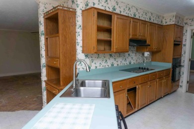Must see this Fixer Upper GOLF HOME that sits behind the scenic on Monticello Golf Club At Savannah Lakes in South Carolina - for sale on GolfHomes.com, golf home, golf lot