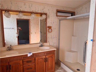 Welcome to this spacious 2-bedroom, 2-bath mobile home offering on The Club At Shenandoah Springs in California - for sale on GolfHomes.com, golf home, golf lot