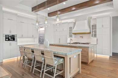 Enjoy sweeping southern exposure and serene golf course views on The Moorings Country Club in Florida - for sale on GolfHomes.com, golf home, golf lot