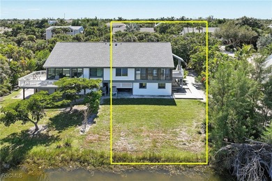 The perfect island retreat! Enjoy beautiful lake views from this on The Dunes Golf and Tennis Club in Florida - for sale on GolfHomes.com, golf home, golf lot