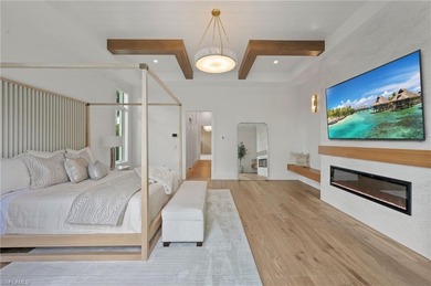 Enjoy sweeping southern exposure and serene golf course views on The Moorings Country Club in Florida - for sale on GolfHomes.com, golf home, golf lot