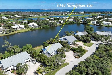 The perfect island retreat! Enjoy beautiful lake views from this on The Dunes Golf and Tennis Club in Florida - for sale on GolfHomes.com, golf home, golf lot