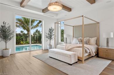 Enjoy sweeping southern exposure and serene golf course views on The Moorings Country Club in Florida - for sale on GolfHomes.com, golf home, golf lot