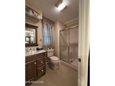 Beautiful brick 3 bedroom, 3 bathroom home in sought-after on Druid Hills Golf Club in Tennessee - for sale on GolfHomes.com, golf home, golf lot