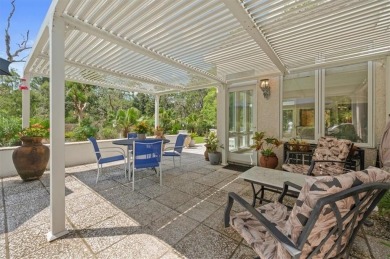This Saint Simons Island contemporary style custom home offers on Sea Palms Golf and Tennis Resort in Georgia - for sale on GolfHomes.com, golf home, golf lot