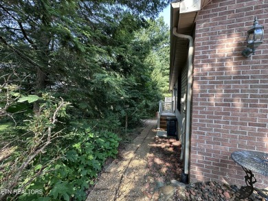 Beautiful brick 3 bedroom, 3 bathroom home in sought-after on Druid Hills Golf Club in Tennessee - for sale on GolfHomes.com, golf home, golf lot