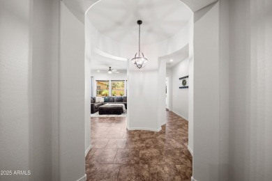 Welcome to this stunning 5 + 1 bedroom, 3-bathroom home nestled on Verrado Golf Club  in Arizona - for sale on GolfHomes.com, golf home, golf lot