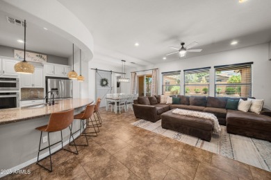 Welcome to this stunning 5 + 1 bedroom, 3-bathroom home nestled on Verrado Golf Club  in Arizona - for sale on GolfHomes.com, golf home, golf lot