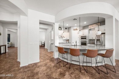 Welcome to this stunning 5 + 1 bedroom, 3-bathroom home nestled on Verrado Golf Club  in Arizona - for sale on GolfHomes.com, golf home, golf lot