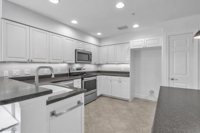 This gorgeous lower level coach home is a must-see property in on Verandah Golf Course and Club in Florida - for sale on GolfHomes.com, golf home, golf lot