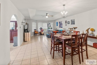 Spacious 3-bed, 3-bath home with two master suites--perfect for on Harlingen Country Club in Texas - for sale on GolfHomes.com, golf home, golf lot