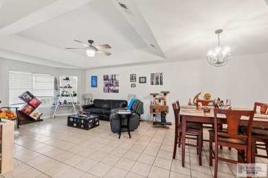 Spacious 3-bed, 3-bath home with two master suites--perfect for on Harlingen Country Club in Texas - for sale on GolfHomes.com, golf home, golf lot
