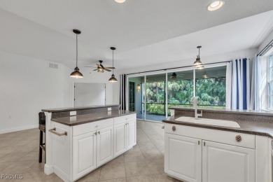 This gorgeous lower level coach home is a must-see property in on Verandah Golf Course and Club in Florida - for sale on GolfHomes.com, golf home, golf lot