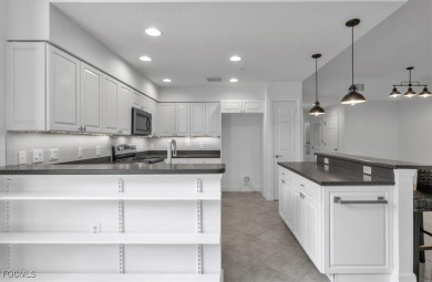 This gorgeous lower level coach home is a must-see property in on Verandah Golf Course and Club in Florida - for sale on GolfHomes.com, golf home, golf lot