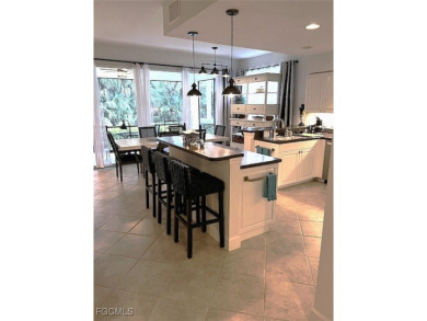 This gorgeous lower level coach home is a must-see property in on Verandah Golf Course and Club in Florida - for sale on GolfHomes.com, golf home, golf lot
