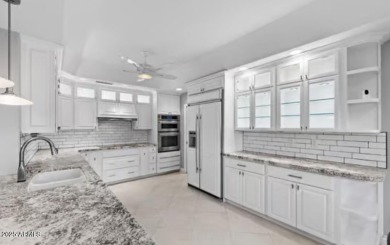 Welcome to this stunning 2-bedroom + den home perfectly on Sunland Springs Golf Course  in Arizona - for sale on GolfHomes.com, golf home, golf lot