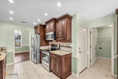 Move-in ready brick beauty in sought-after Olive Branch! Backing on Olive Branch Country Club in Mississippi - for sale on GolfHomes.com, golf home, golf lot