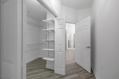 This gorgeous lower level coach home is a must-see property in on Verandah Golf Course and Club in Florida - for sale on GolfHomes.com, golf home, golf lot