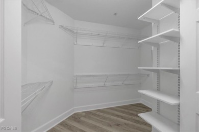 This gorgeous lower level coach home is a must-see property in on Verandah Golf Course and Club in Florida - for sale on GolfHomes.com, golf home, golf lot