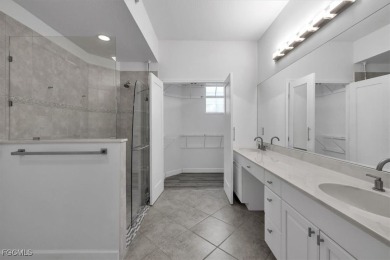 This gorgeous lower level coach home is a must-see property in on Verandah Golf Course and Club in Florida - for sale on GolfHomes.com, golf home, golf lot