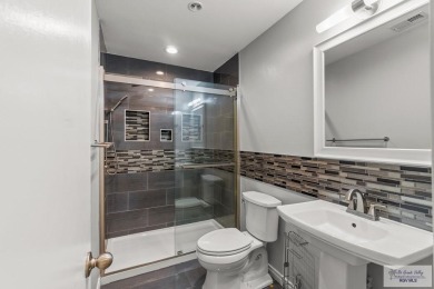 Spacious 3-bed, 3-bath home with two master suites--perfect for on Harlingen Country Club in Texas - for sale on GolfHomes.com, golf home, golf lot