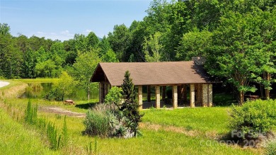 MOUNTAIN VIEWS GALORE on Lots 20 & 21 with 3+ Acres in Tatanka on Rumbling Bald Resort on Lake Lure in North Carolina - for sale on GolfHomes.com, golf home, golf lot