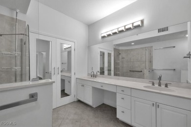 This gorgeous lower level coach home is a must-see property in on Verandah Golf Course and Club in Florida - for sale on GolfHomes.com, golf home, golf lot