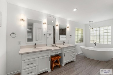 Spacious 3-bed, 3-bath home with two master suites--perfect for on Harlingen Country Club in Texas - for sale on GolfHomes.com, golf home, golf lot