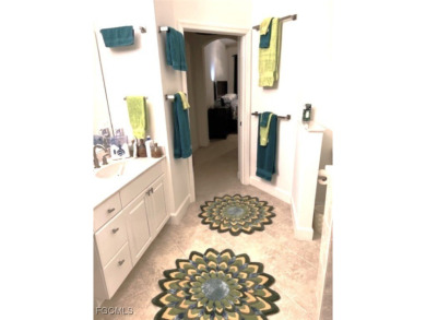 This gorgeous lower level coach home is a must-see property in on Verandah Golf Course and Club in Florida - for sale on GolfHomes.com, golf home, golf lot