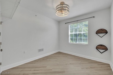 This gorgeous lower level coach home is a must-see property in on Verandah Golf Course and Club in Florida - for sale on GolfHomes.com, golf home, golf lot