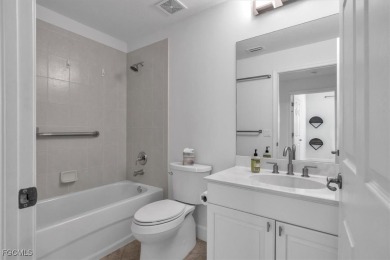 This gorgeous lower level coach home is a must-see property in on Verandah Golf Course and Club in Florida - for sale on GolfHomes.com, golf home, golf lot