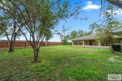 Spacious 3-bed, 3-bath home with two master suites--perfect for on Harlingen Country Club in Texas - for sale on GolfHomes.com, golf home, golf lot