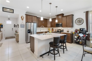 Welcome to this stunning 3-bedroom, 3-bathroom home with an on Harmony Golf Preserve in Florida - for sale on GolfHomes.com, golf home, golf lot