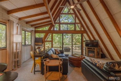 This cozy chalet offers the classic A-frame design with a on Innsbrook Resort Golf Course in Missouri - for sale on GolfHomes.com, golf home, golf lot